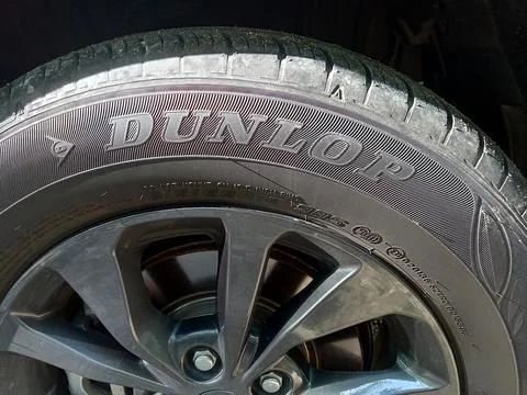 Central Java Indonesia April 7 2024: closeup of car rims and tires. Stockfoto's