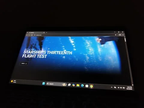 CENTRAL JAVA, INDONESIA - AUG 04, 2026: A laptop screen in a dark room displayin Stock-Fotos