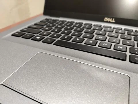 CENTRAL JAVA, INDONESIA - AUG 04, 2026: Close up of a silver Dell laptop keyboar Stock-Fotos