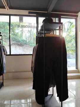 CENTRAL JAVA, INDONESIA - AUG 11, 2026: Sunlight shining through the glass door  Stock Photos