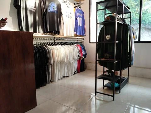 CENTRAL JAVA, INDONESIA - AUG 11, 2026: Interior of a local streetwear clothing  Stock Photos