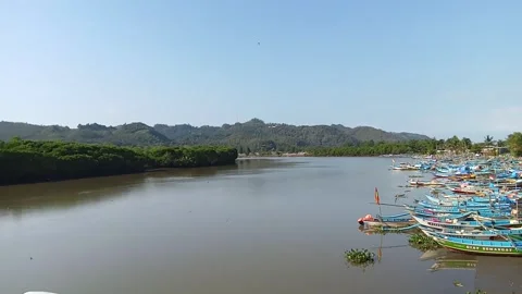 Central Java Indonesia August 1, 2025: fishing boats moored in the river Stock Footage 314277982