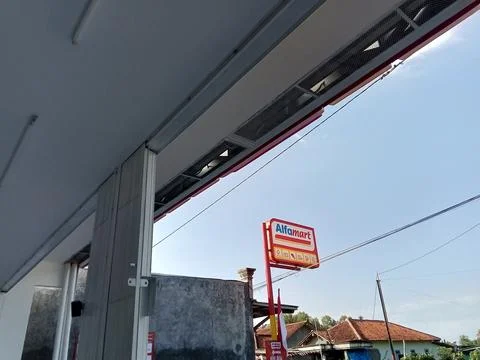 Central Java, Indonesia, August 1, 2025: Alfamart minimarket signboard. Фото