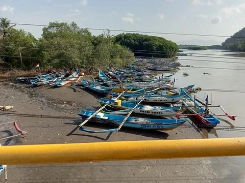 Central Java Indonesia August 1, 2025: wooden fishing boats are anchored. Фото