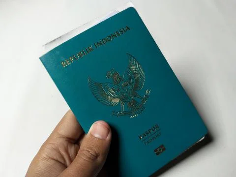 Central Java, Indonesia, August 1, 2026: A person's hand holding a green Republi 库存照片