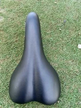 Central Java, Indonesia August 12, 2024: new bicycle saddle, on grass background Stockfoto's
