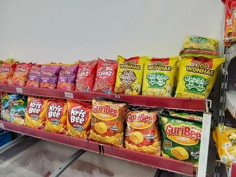 Central Java, Indonesia August 14 2024: shelves of various types Snacks Stock Photos