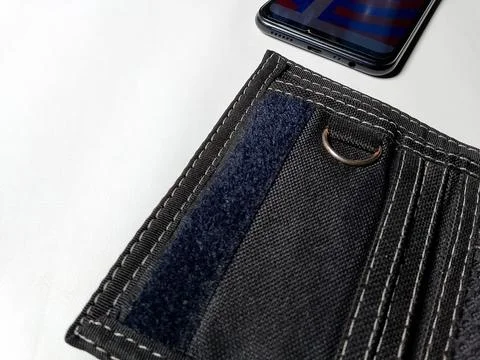 Central Java Indonesia August 14, 2025: wallet and smartphone. Stock-Fotos