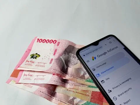Central Java Indonesia August 14, 2025: google adsense make money online  Photos