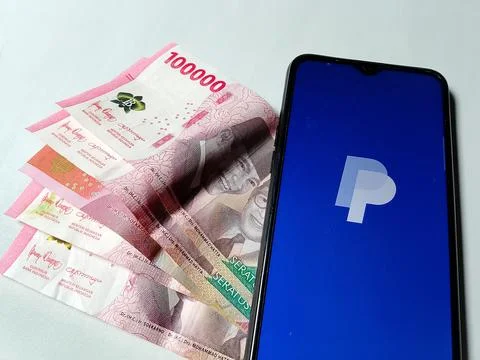 Central Java Indonesia August 14, 2025: Paypal application on mobile devices. Фото