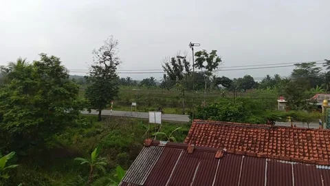 Central Java Indonesia August 18, 2025: on roofs of buildings and vehicles 動画素材 315283172