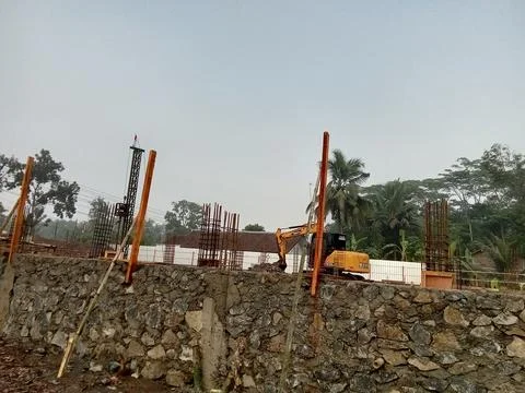 Central Java Indonesia August 24, 2025: Excavator at a construction project. Фото