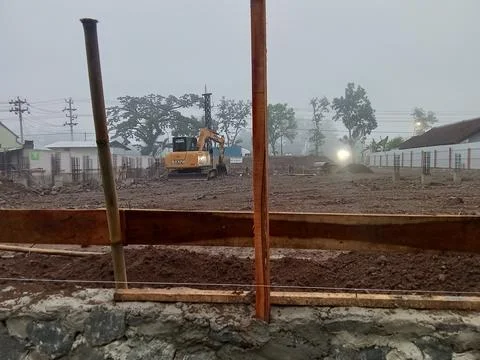 Central Java Indonesia August 24, 2025: Excavator at a construction project. Фото