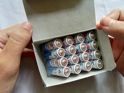 Central Java Indonesia December 11, 2022: a person holding a box package of ABC Foto stock