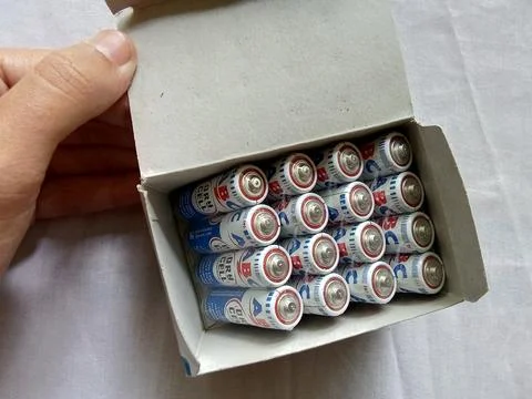 Central Java Indonesia December 11, 2022: a person holding a box package of ABC  Foto stock