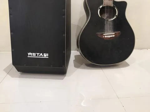 Central Java Indonesia February 14, 2026: cajon and guitar musical instruments a Fotos Stock