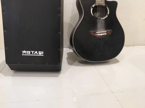 Central Java Indonesia February 14, 2026: cajon and guitar musical instruments a Stockfoto's