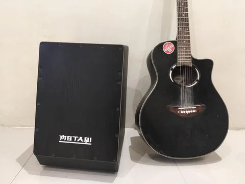 Central Java Indonesia February 14, 2026: cajon and guitar musical instruments a Stock Photos