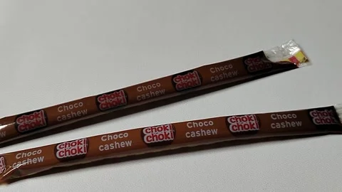 Central Java Indonesia February 15, 2026: Choki Choki chocolate snacks. 스톡 동영상 329203699