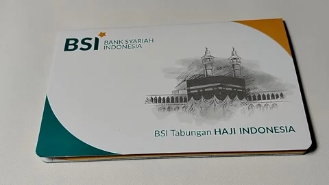 Central Java Indonesia February 15, 2026: Bank Syariah Indonesia savings book  스톡 동영상 329205369
