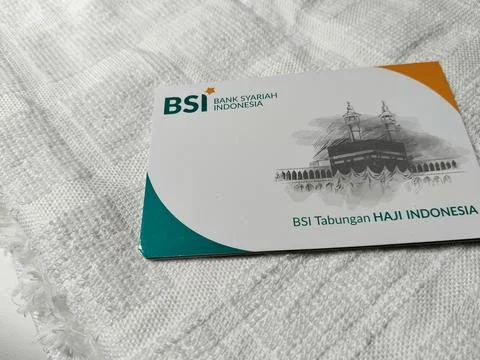 Central Java Indonesia February 15, 2026: BSI bank savings book and ihram cloth Фото