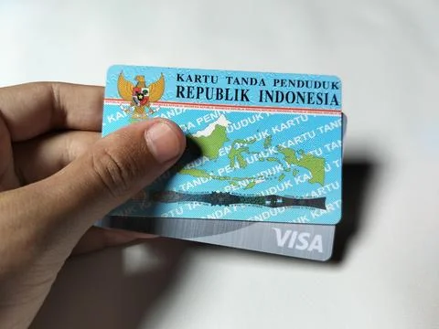 Central Java Indonesia February 15, 2026: A person holding an ID card and a BSI  Stock-Fotos