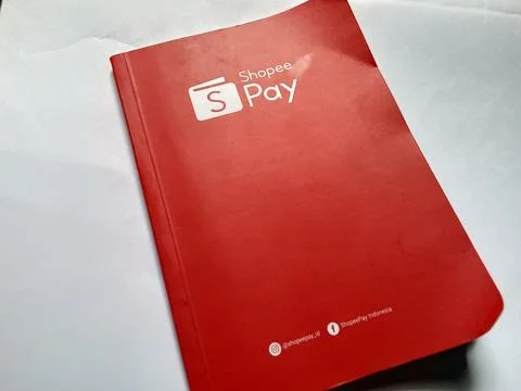 Central java Indonesia February 18, 2023: small shopee pay notebook. Stock-Fotos