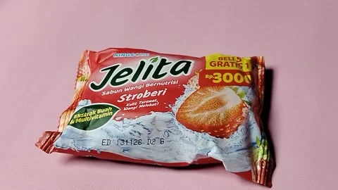 Central Java, Indonesia, February 27, 2026: Strawberry scented Jelita bar soap  Stock Footage 330808003