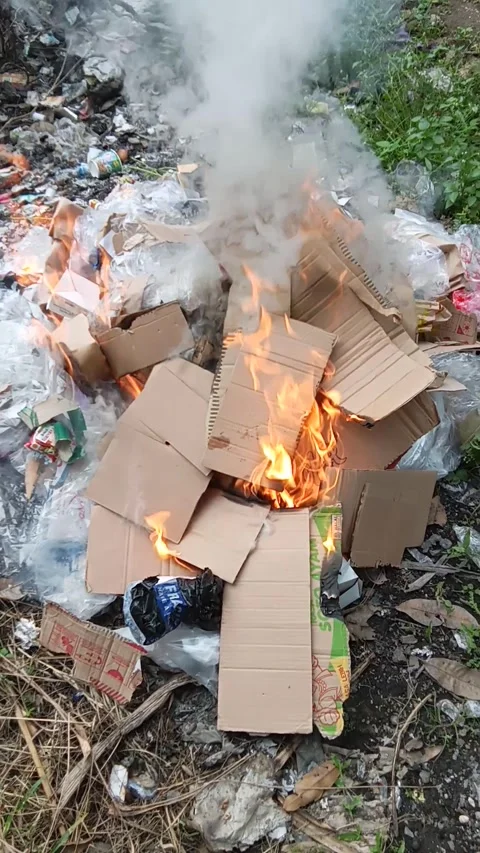 Central Java Indonesia February 3 2025: burning rubbish fire burning. Stock Footage 301305111