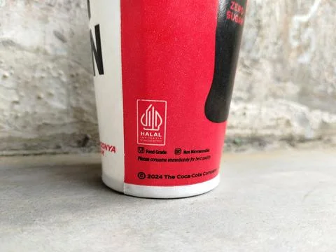 Central Java Indonesia January 11, 2026: kfc drink paper cup, halal logo. Фото