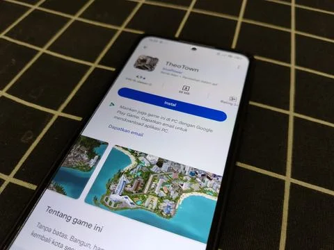 Central Java, Indonesia, January 14, 2026: TheoTown is a simulation game  Фото