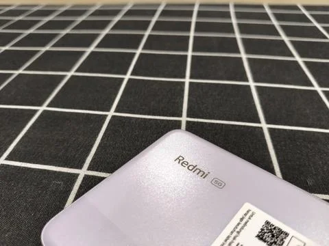 Central Java Indonesia January 14, 2026: Closeup of Redmi writing on the back Stockfoto's