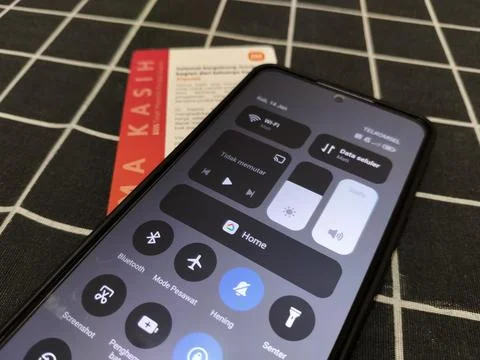 Central Java Indonesia January 14, 2026: Control center display on android. 스톡 사진