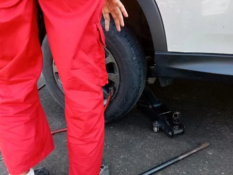 Central Java Indonesia January 20 2024: officers checking the condition of car Фото