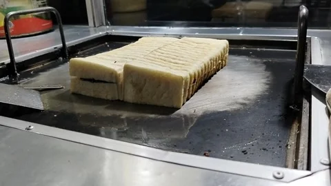 Central Java Indonesia January 22, 2026: street food toast. Stock Footage 327521559