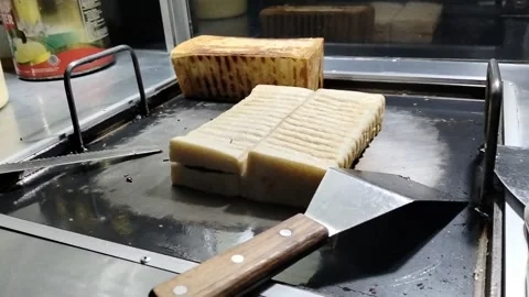 Central Java Indonesia January 22, 2026: street food toast. 動画素材 327521560