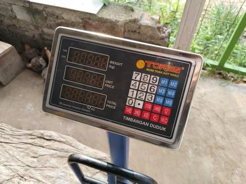 Central Java Indonesia January 24 2026: Digital sitting scales, at a trader's  Фото