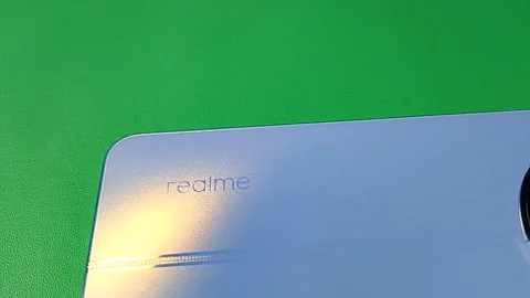 Central Java Indonesia January 30, 2026: Realme smartphone written Vídeos de archivo 328524544