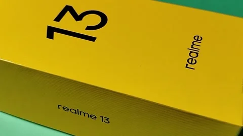Central Java Indonesia January 30, 2026: New smartphone packaging box, realme 13 Video stock 328524587