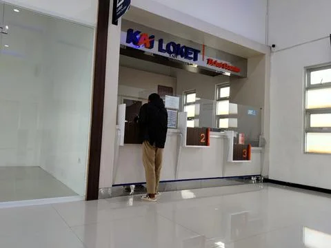 Central Java Indonesia January 7, 2026: a man at the train ticket counter. Stock-Fotos