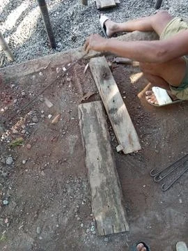 Central Java, Indonesia, July 11, 2025: a worker is forming iron for a building  Fotos Stock