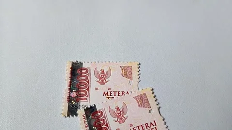 Central Java Indonesia July 23, 2025: 10,000 Indonesian stamp Stock Footage 313801560