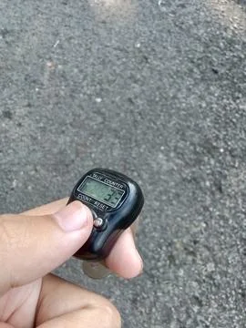 Central Java, Indonesia July 27, 2024: A person holding a digital prayer beads. Фото