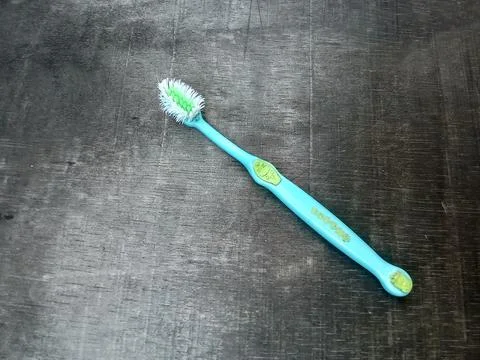 Central Java, Indonesia July 30, 2024: black background children's toothbrush. Stock-Fotos