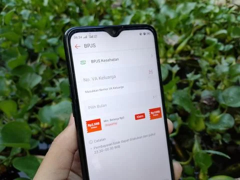 Central Java Indonesia July 31, 2025: Pay BPJS health insurance on the Shopee ap Photos