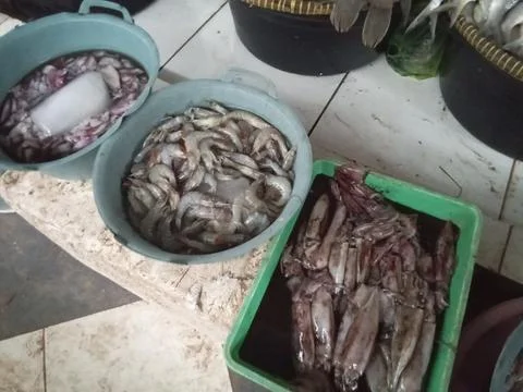 Central Java Indonesia June 1, 2025: fish traders at traditional markets. Фото