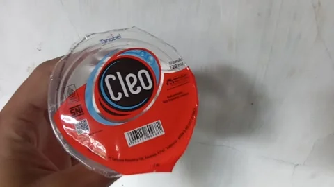 Central Java Indonesia June 16, 2025: Cleo drinking water Stock Footage 311519708