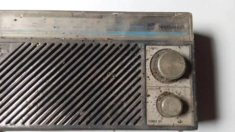 Central Java Indonesia June 16, 2025: An old radio that has not been used for a  Stock Footage 311653952