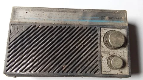 Central Java Indonesia June 16, 2025: An old radio that has not been used for a  Stock Footage 311654041