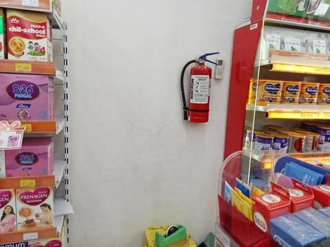 Central Java Indonesia June 17 2024:light fire extinguisher, at minimarket. Фото